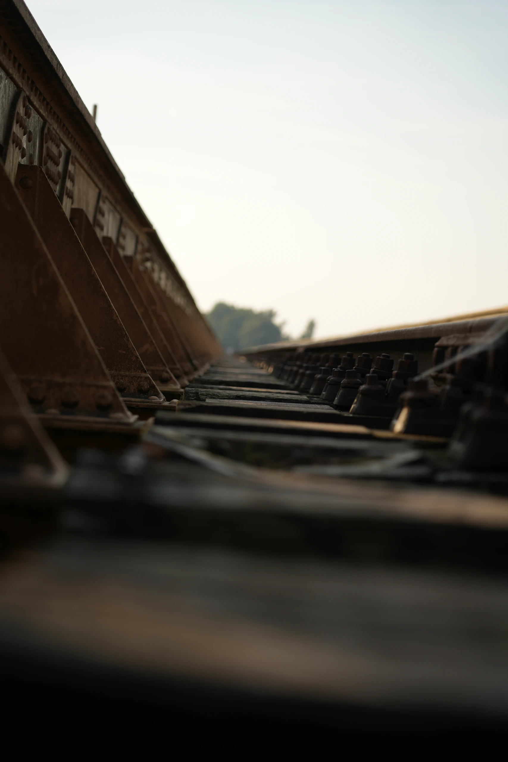 The bridge’s steel truss runs into the distance